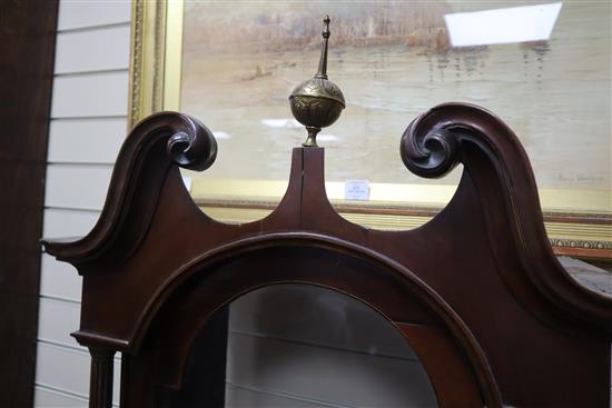 An early 19th century mahogany 8 day striking longcase clock, the arched enamelled dial painted with a portrait of Admiral Lord Nelson